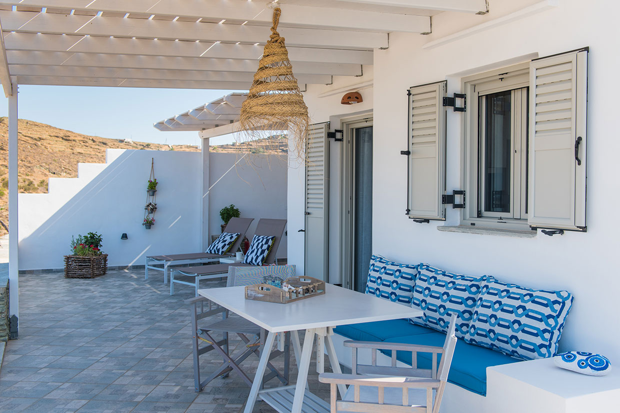 Lydia house in Sifnos, sunny courtyard with furniture